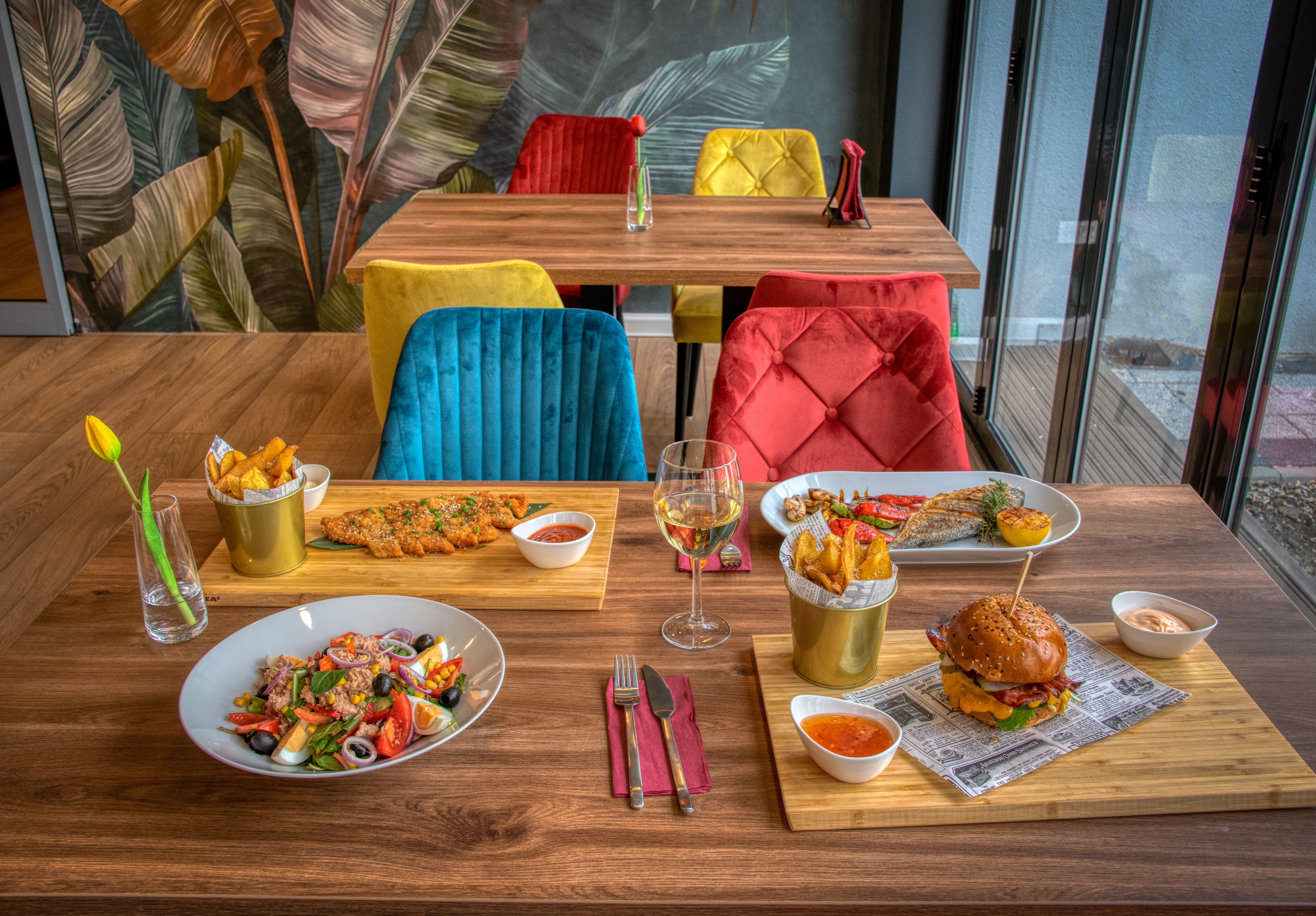 Table of shared dishes at a restaurant in Denver, CO